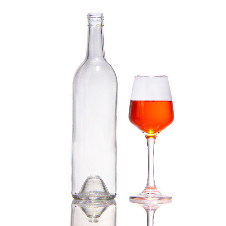 L'usine vend des bouteilles en verre vert foncé et une bouteille en verre de vin rouge avec un couvercle étanche