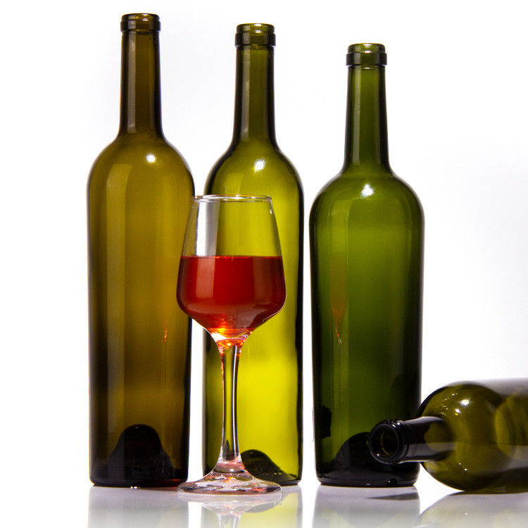 L'usine vend des bouteilles en verre vert foncé et une bouteille en verre de vin rouge avec un couvercle étanche