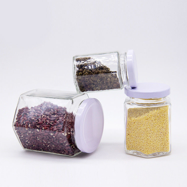 Bouteilles de verre rondes transparentes de 100 ml pour le stockage du miel Emballage alimentaire avec couvercles métalliques