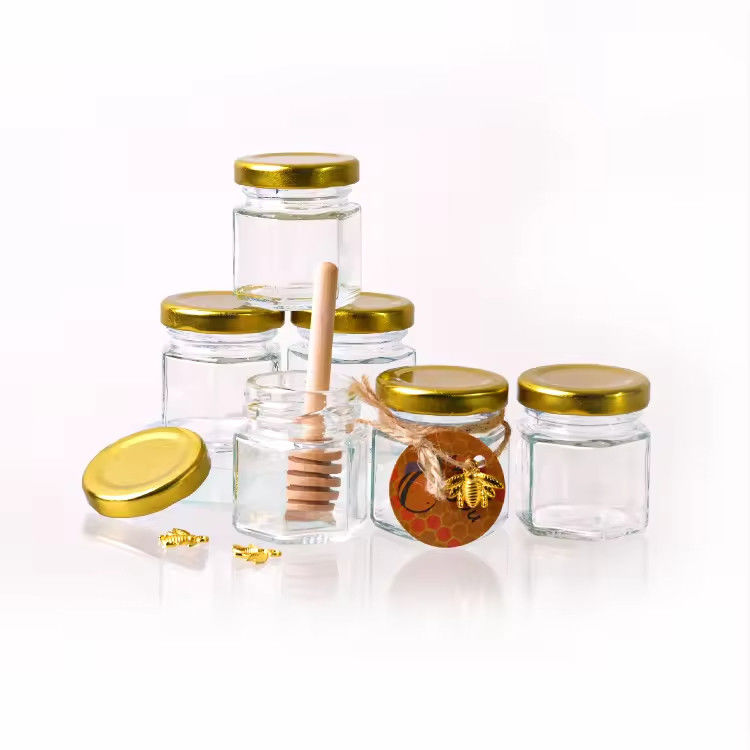Étiquette personnalisée Forme hexagonale 100ml 180ml 380ml Bouteille en verre de miel Pour confiture de fruits d'olive