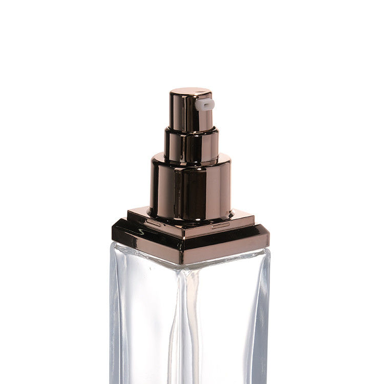 Bouteille de pompe en verre transparent de 30 ml, 50 ml, 80 ml et 100 ml pour le sérum, l' huile essentielle et la lotion parfumée.