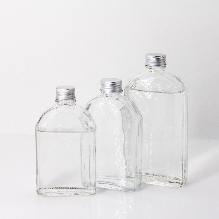 Nouveau design 200ml 250ml 300ml Bouteille en verre transparent à vis