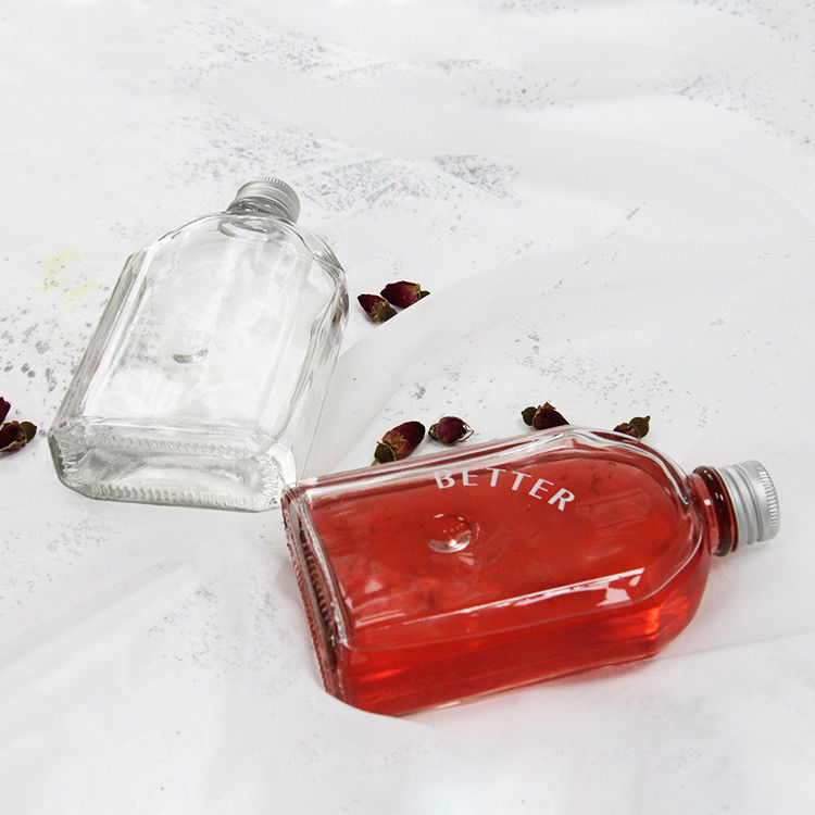 Nouveau design 200ml 250ml 300ml Bouteille en verre transparent à vis