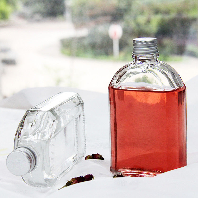 Nouveau design 200ml 250ml 300ml Bouteille en verre transparent à vis