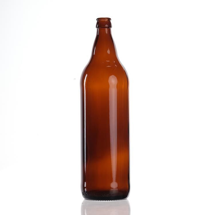 Bière vert ambrée de haute qualité Bouteille en verre Bière à étiquette chaude claire