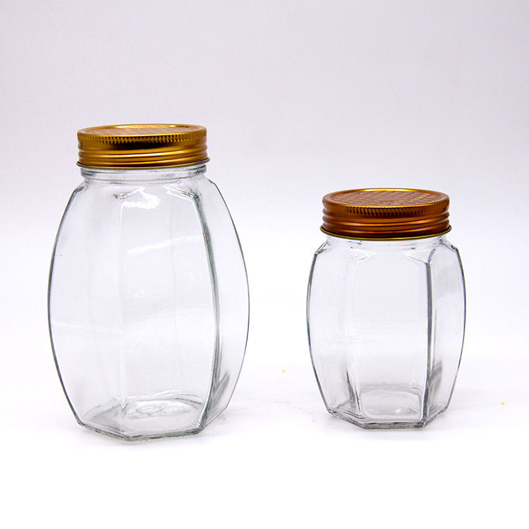 Bouteille ronde de haute qualité Bouteille de verre scellée Bouteille de stockage de miel Bouteille de qualité alimentaire