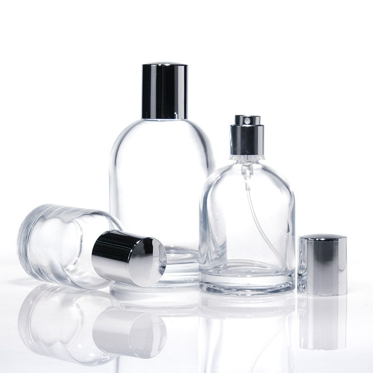 Bouteilles de parfums en verre rond de luxe de 30 ml, 50 ml et 100 ml avec murs épais et carrés, avec capuchons en bois et boîtes sur mesure