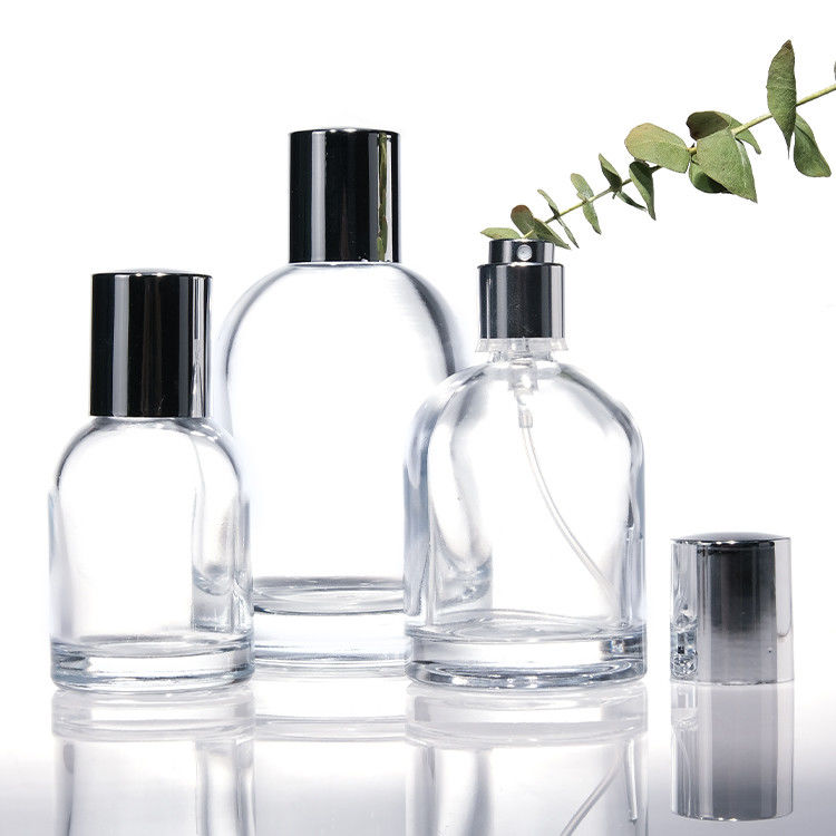 Bouteilles de parfums en verre rond de luxe de 30 ml, 50 ml et 100 ml avec murs épais et carrés, avec capuchons en bois et boîtes sur mesure