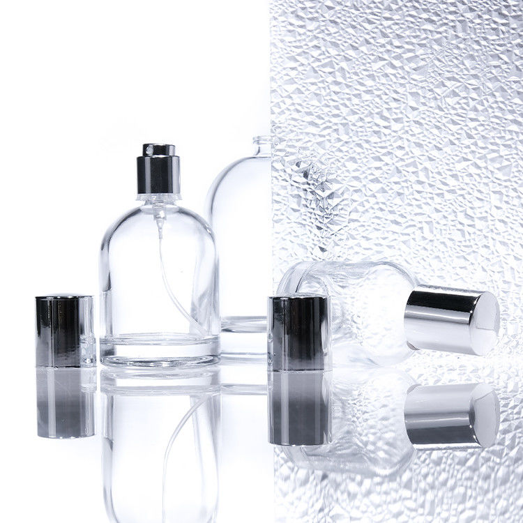 Bouteilles de parfums en verre rond de luxe de 30 ml, 50 ml et 100 ml avec murs épais et carrés, avec capuchons en bois et boîtes sur mesure
