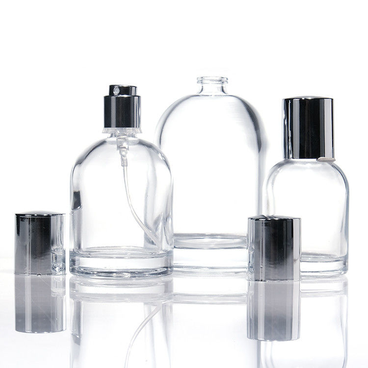 Bouteilles de parfums en verre rond de luxe de 30 ml, 50 ml et 100 ml avec murs épais et carrés, avec capuchons en bois et boîtes sur mesure