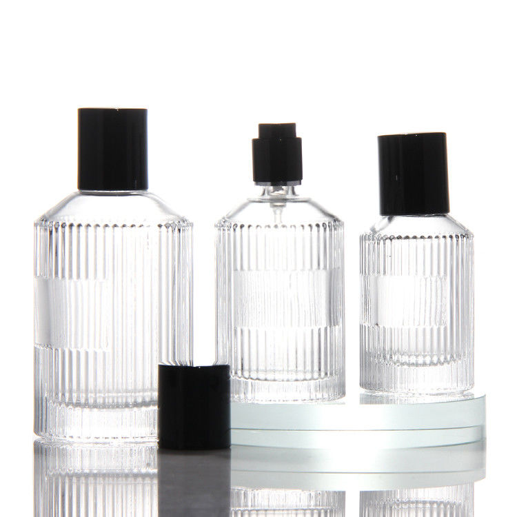 Bouteille de parfum transparente en cylindre OEM Bouteille de parfum en verre de 50 ml avec boîte cadeau Pompe pulvérisatrice
