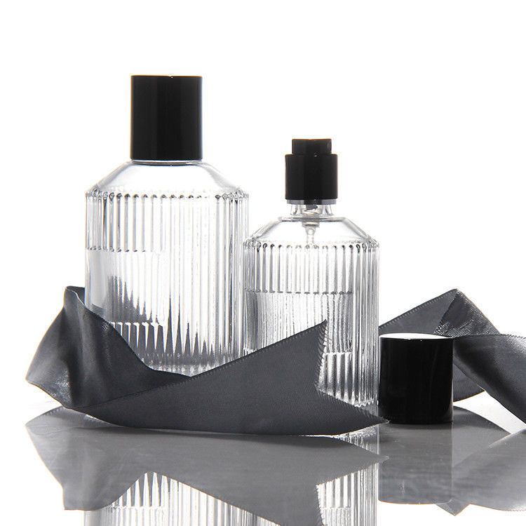 Bouteille de parfum transparente en cylindre OEM Bouteille de parfum en verre de 50 ml avec boîte cadeau Pompe pulvérisatrice