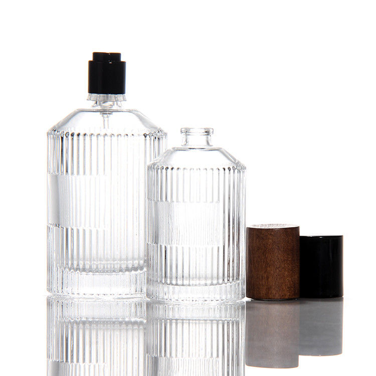 Bouteille de parfum transparente en cylindre OEM Bouteille de parfum en verre de 50 ml avec boîte cadeau Pompe pulvérisatrice