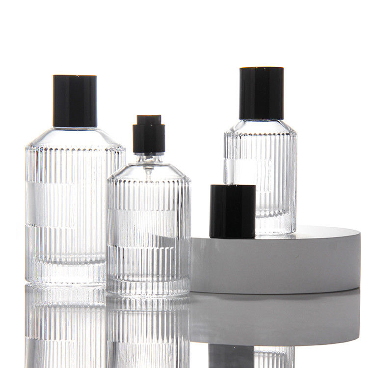 Bouteille de parfum transparente en cylindre OEM Bouteille de parfum en verre de 50 ml avec boîte cadeau Pompe pulvérisatrice