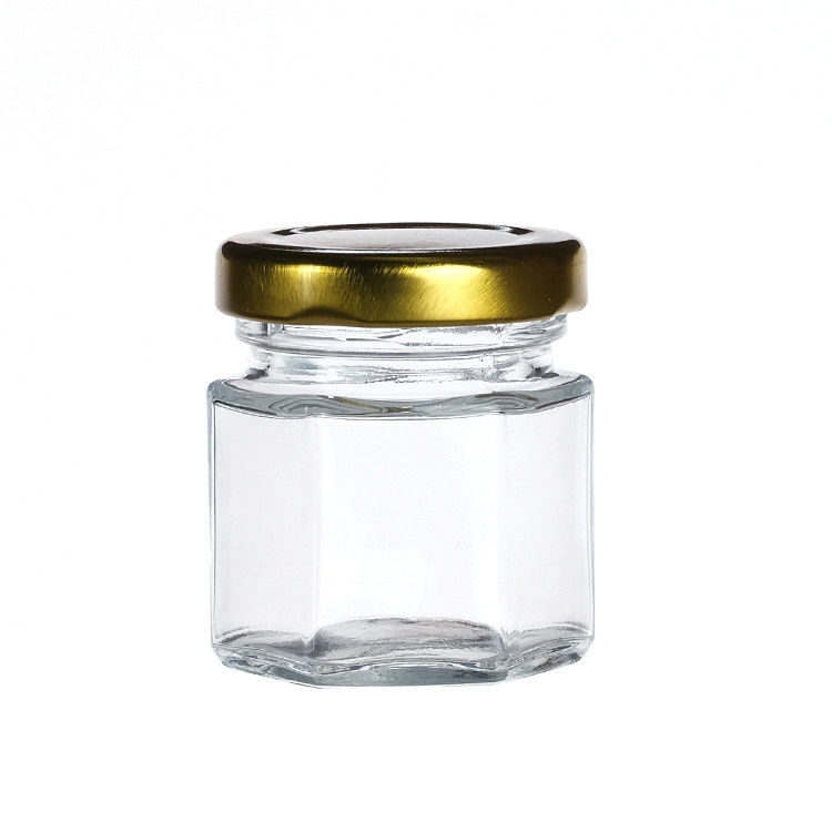 Bouteilles claires avec couvercles Bouteille de verre hexagonale pour le thé