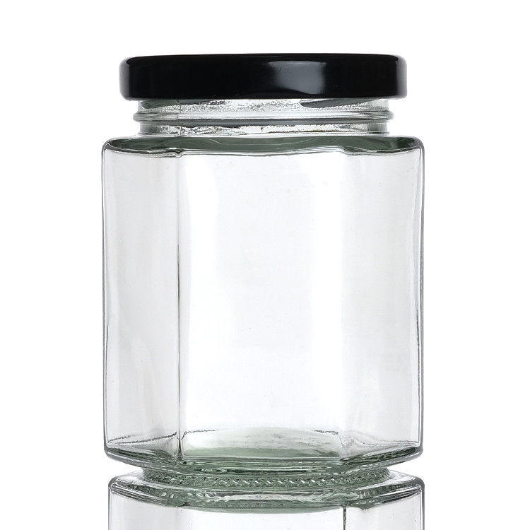 Bouteilles claires avec couvercles Bouteille de verre hexagonale pour le thé