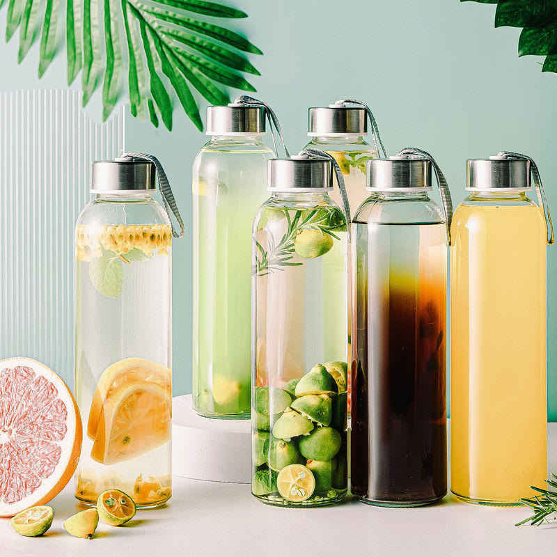 Bouteille d'eau potable en verre borosilicate de haute qualité en gros avec couvercle en acier inoxydable