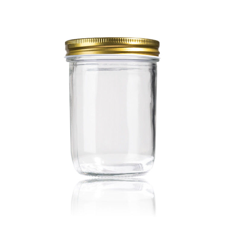 Une bouteille de miel de haute qualité avec couvercle.